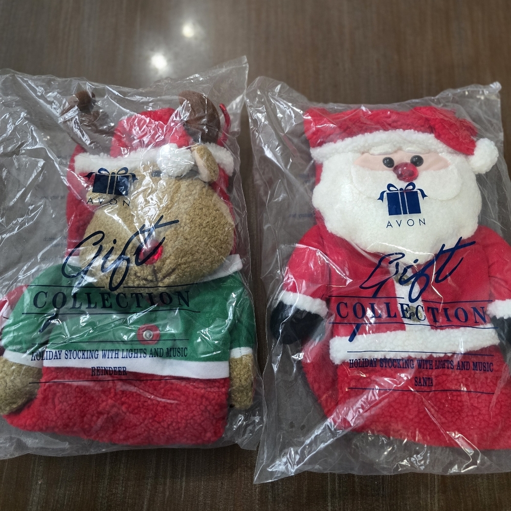 Vintage SEALED 1999 Avon Holiday Stocking With Lights And Music Reindeer& Santa